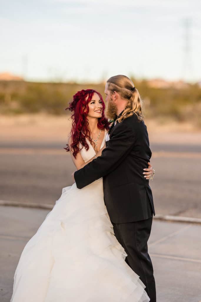 Bride and groom looking into each other's eyes at Superstition Manor Wedding Venue in Phoenix Arizona