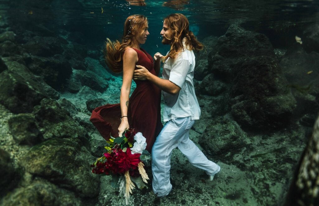 Engagement session taken underwater at the Three Sister Springs in Crystal River Florida